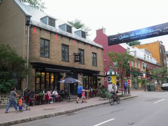 Cute street with cafes and markets, with more locals than tourists. Buzzing nightlife.