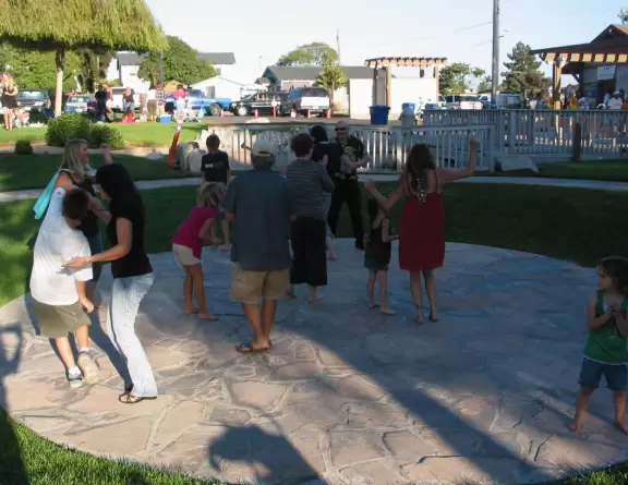 City park with amphitheatre, huge lawn, and wooden bridge over a cute manmade stream. Fantastic free summer concerts!