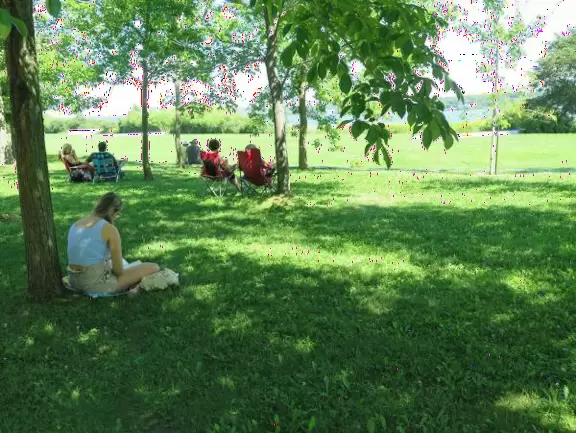 Wonderful spot along the river, with happy people biking and roller blading by. Observation tower with sweeping views.