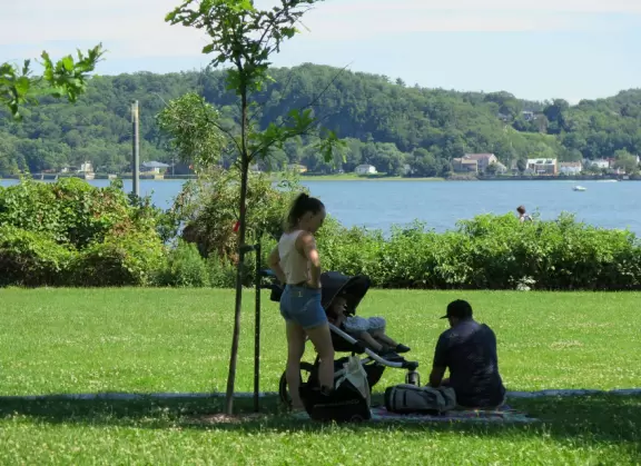 Wonderful spot along the river, with happy people biking and roller blading by. Observation tower with sweeping views.