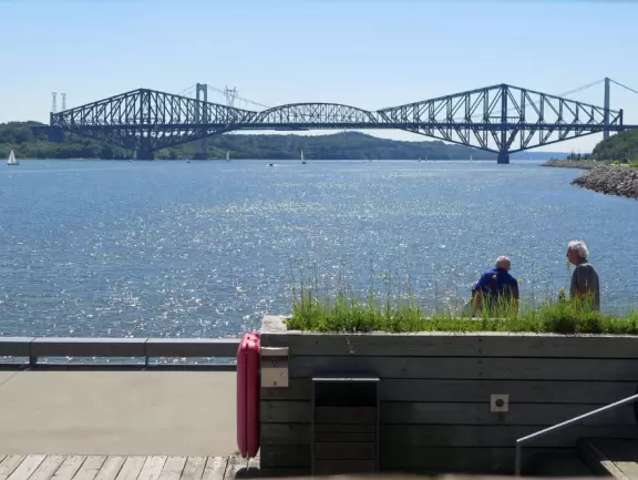Wonderful spot along the river, with happy people biking and roller blading by. Observation tower with sweeping views.