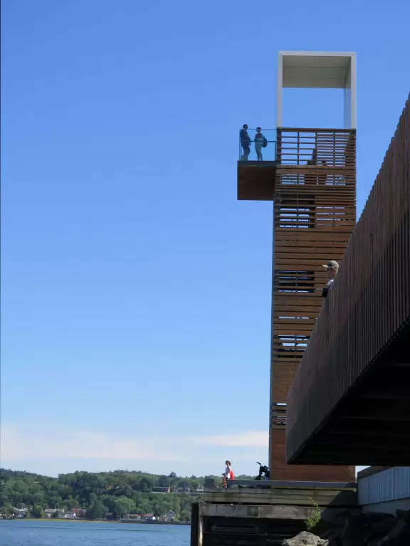 Wonderful spot along the river, with happy people biking and roller blading by. Observation tower with sweeping views.