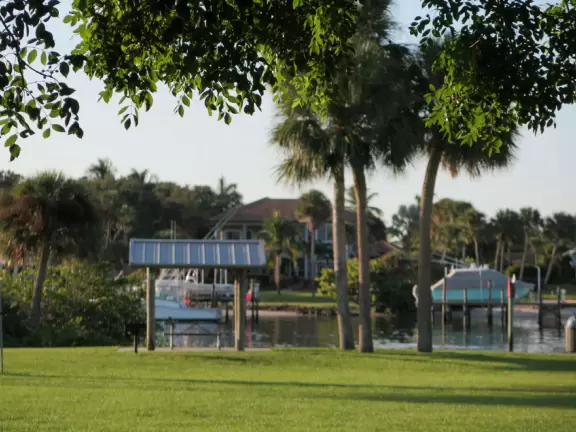 Waterfront park with amazing colors in the water- views of an island and blue-green sandbars. Plenty of benches and docks, and a playground.