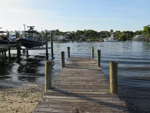 Waterfront park with amazing colors in the water- views of an island and blue-green sandbars. Plenty of benches and docks, and a playground.