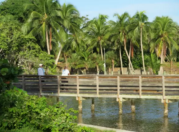 Waterfront park with amazing colors in the water- views of an island and blue-green sandbars. Plenty of benches and docks, and a playground.