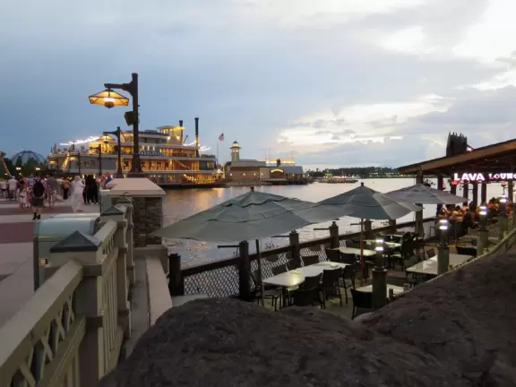 Waterfront area with restaurants, live street performers, entertainment, toy stores, and carousel.