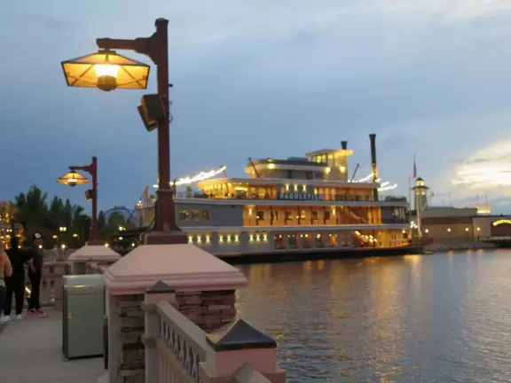 Waterfront area with restaurants, live street performers, entertainment, toy stores, and carousel.