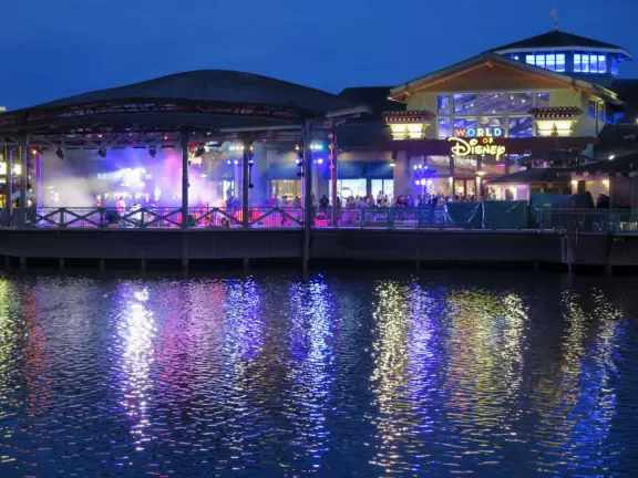 Waterfront area with restaurants, live street performers, entertainment, toy stores, and carousel.