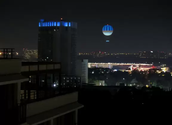 Waterfront area with restaurants, live street performers, entertainment, toy stores, and carousel.