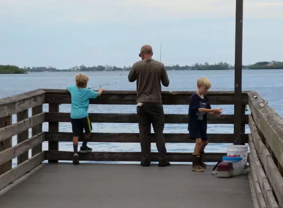 Waterfront park with amazing colors in the water- views of an island and blue-green sandbars. Plenty of benches and docks, and a playground.