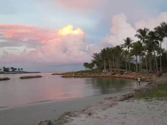 Beach where fishermen hang out on the jetty and surfers come to ride the waves at Jupiter Inlet.