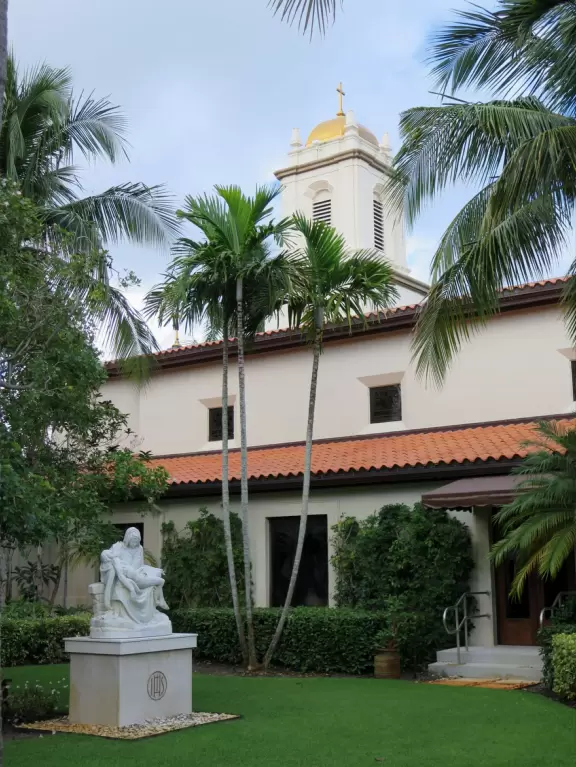A peaceful garden, open in the mornings, with statues where you can light a candle.