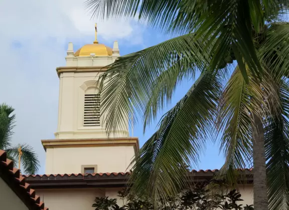 A peaceful garden, open in the mornings, with statues where you can light a candle.