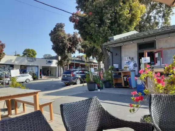 A lovely, hilly street with ocean views, lined with cute cafes.