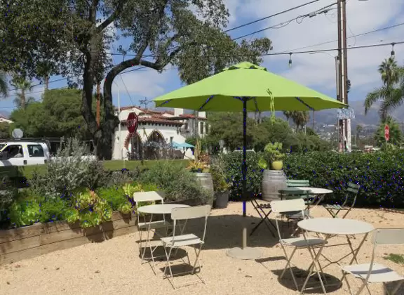 Hip area with wine bars, cafes, and bakeries, where you can sit on a patio surrounded by ivy-covered walls.
