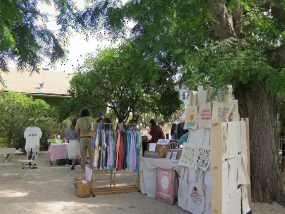 Hip area with wine bars, cafes, and bakeries, where you can sit on a patio surrounded by ivy-covered walls.