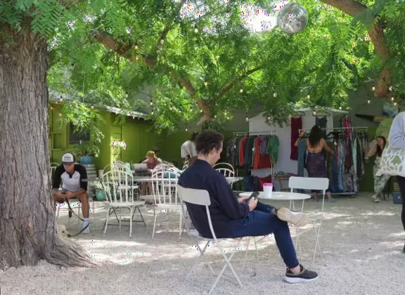 Hip area with wine bars, cafes, and bakeries, where you can sit on a patio surrounded by ivy-covered walls.