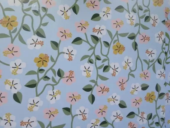 Outdoor shopping and entertainment district with European architecture, archways, palms, tropical flowers, and amazing fountain for kids.