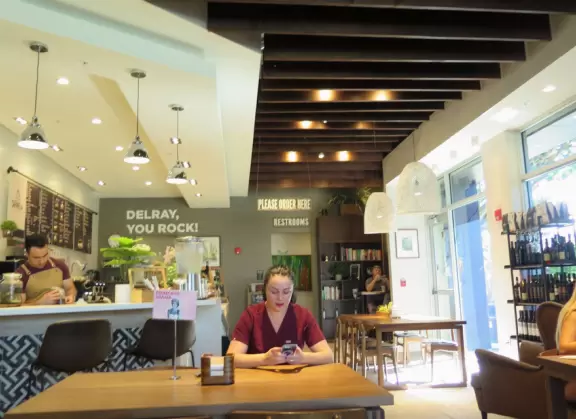 Outdoor mall with movie theater, cafes with atmosphere, candy shop, and more.