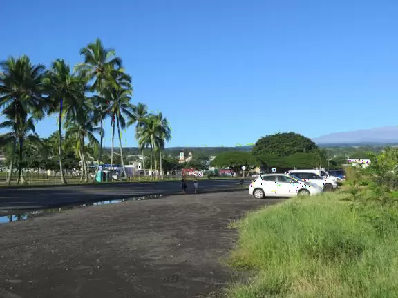 Green, green&nbsp;gardens with Japanese bridges and ponds, and views of silvery Hilo Bay and Mauna Kea.