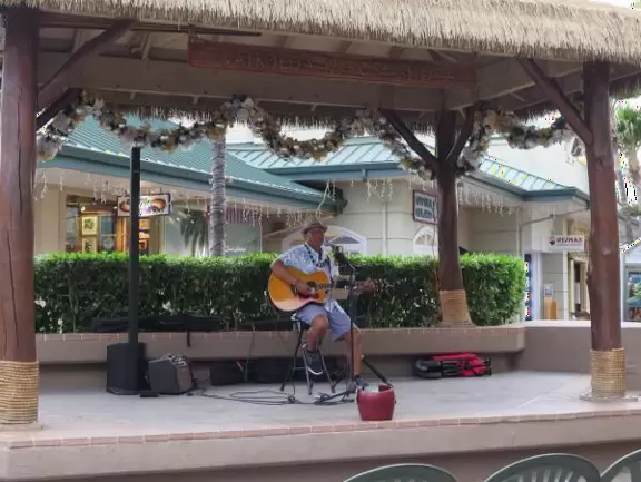 Nice outdoor mall with cafes, live music, and shops.