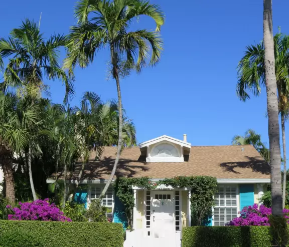 Lovely walk past mansions, flowers, statues, and lanterns.