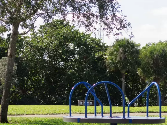 Park with huge new playground and lots of amenities, including boat docks on a narrow canal.