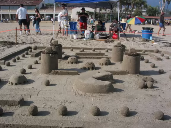 A wide sandy beach that's fun for kids! Wonderful for a long walk around the red cliffs.