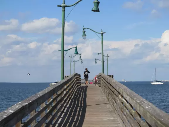 A lovely place to be on the water, watch pelicans, see sailboats, and play on the playground.