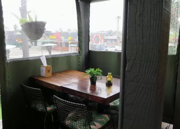 Neighborhood with cute 1920s craftsman houses and plenty of bars and cafes.