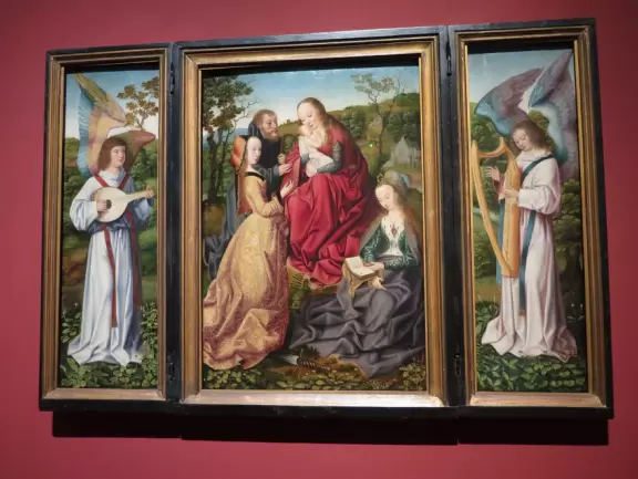 Art museum in a beautiful building in Balboa Park, with pleasant patio cafe beside a lawn.