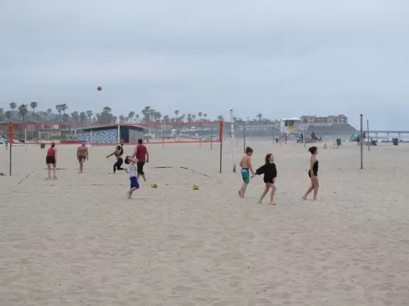 Popular beach with dog owners, on the channel, with lots of open space and dunes, plus jetties and a view of the pier.