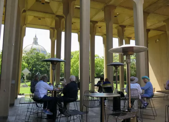 Art museum in a beautiful building in Balboa Park, with pleasant patio cafe beside a lawn.