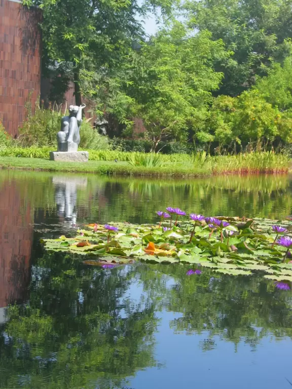 Wonderful art museum with modern, streamlined interior, and lily-pond gardens outside.
