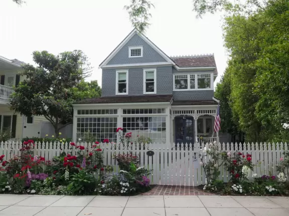 A walk among tropical trees and flowers, and the sweetest houses.
