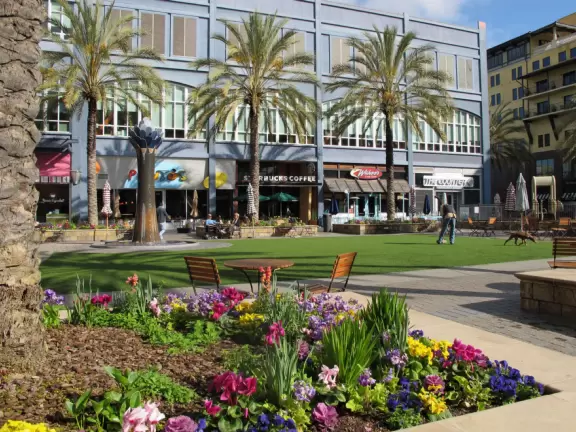 A sophisticated European-style development with shops, cafes, fountains, gorgeous architecture, and the most amazing flower baskets!