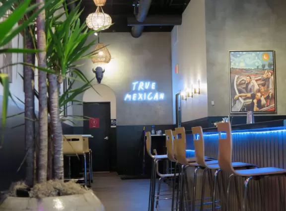 Nice place to dine, with a fountain area kids can run around and large sloping park above the center.