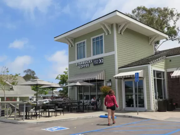 Grocery store shopping plaza that is cozy, with eucalyptus galore, not on the beach though.