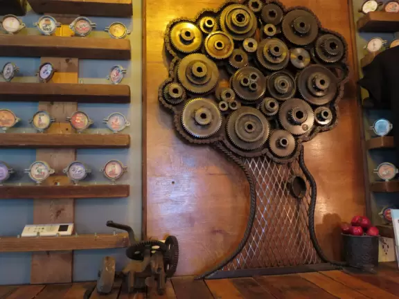 Metalwork tree inside Pierced Ciderworks. 