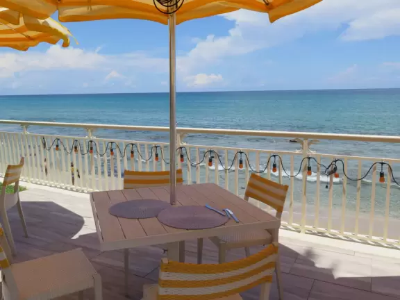 The views from Breeze Open Kitchen in Eau Palm Beach Resort are mesmerizing. Sit out on the patio and feel the breeze.