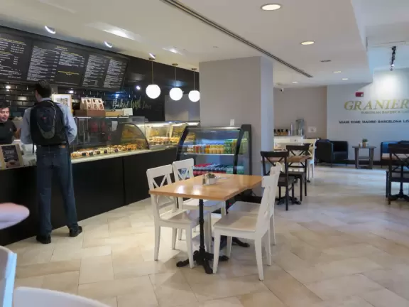 Unique glass skyscrapers reaching up to the perfect blue sky.