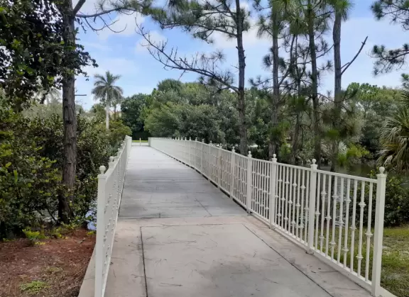 Lovely sidewalks lined with trees, where you pass fountains, parks, and colorful townhouses.