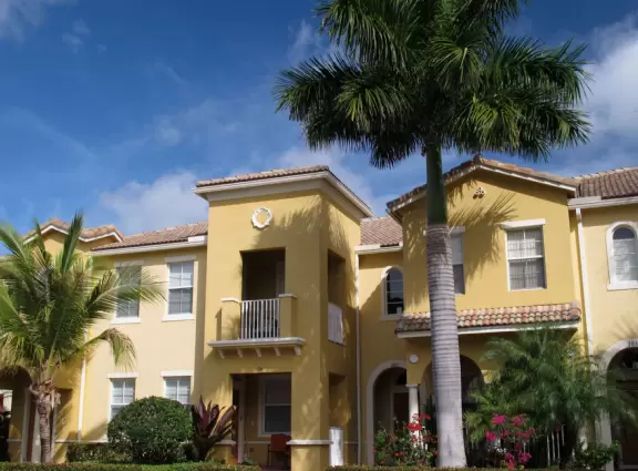 Lovely sidewalks lined with trees, where you pass fountains, parks, and colorful townhouses.