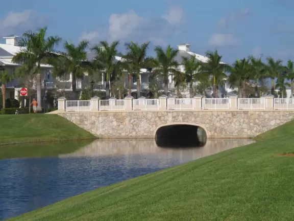 Lovely sidewalks lined with trees, where you pass fountains, parks, and colorful townhouses.