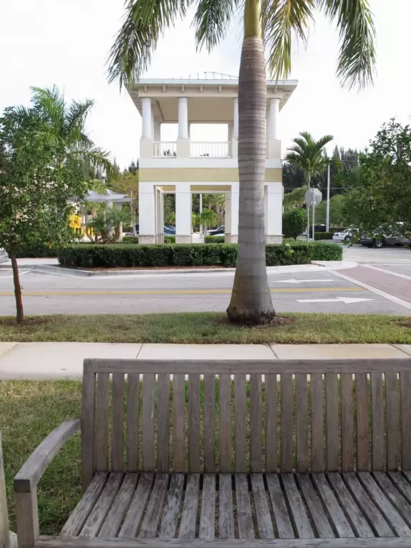 Lovely sidewalks lined with trees, where you pass fountains, parks, and colorful townhouses.