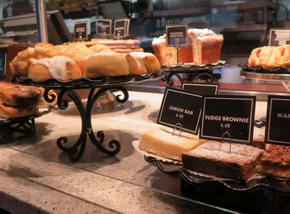 Outdoor shopping center with Daiso Japanese variety store.