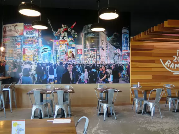 Nice place to dine, with a fountain area kids can run around and large sloping park above the center.