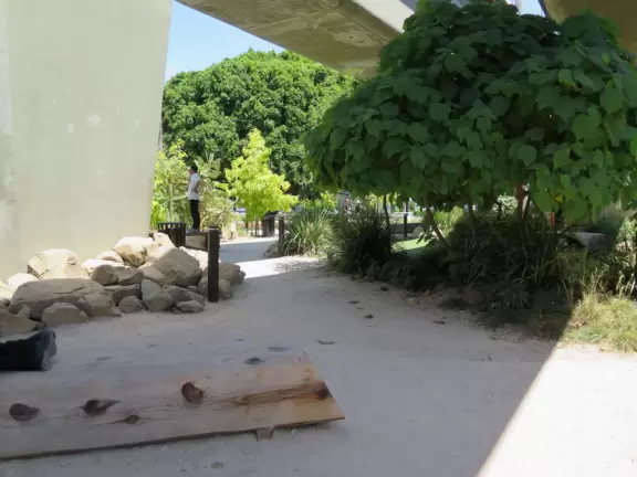 Small shopping center with cafes and trendy shops.