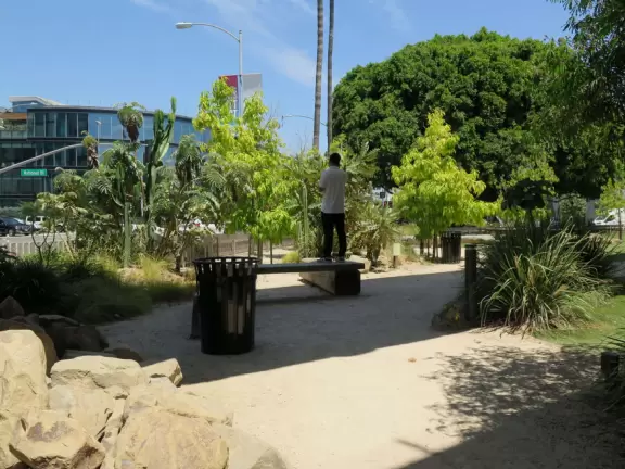 Small shopping center with cafes and trendy shops.