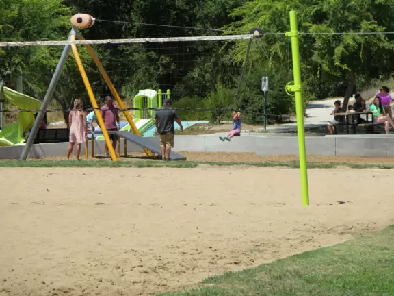 Best playground you'll ever visit! Huge slides, hillside slides, steep grass slope for cardboard sledding, cable zipline, and pretty trees to picnic under.